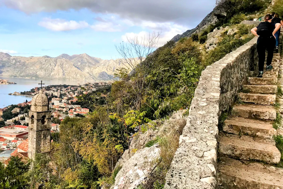 Hiking the 1350 stone steps of Kotor Fortress city walls Montenegro