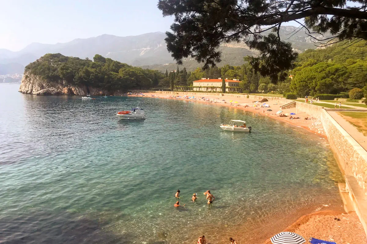 The pine-shaded walkway leading to the King's Beach in Miločer Park