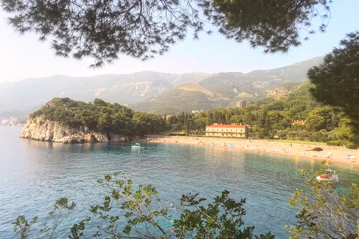 Cinematic panoramic vista of the crystal-clear turquoise waters stretching along Miločer Beach