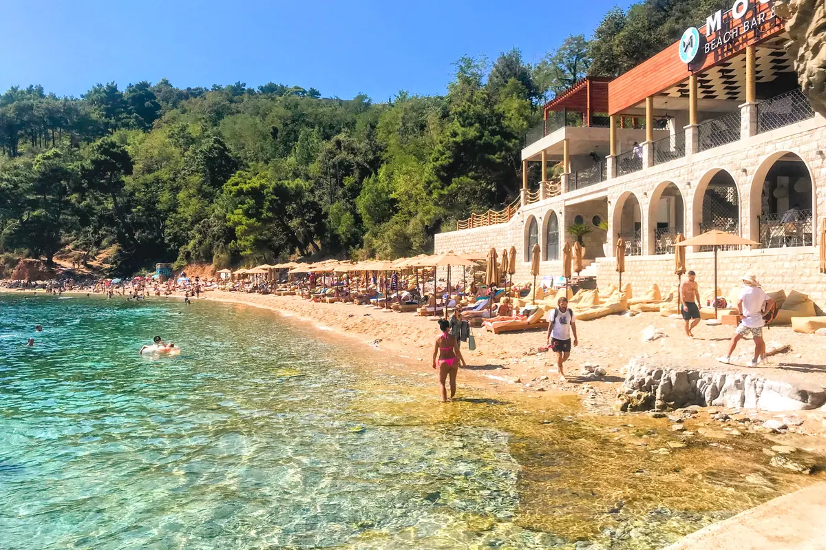 Mogren II Beach, near Budva,  with sun loungers and beach restaurant
