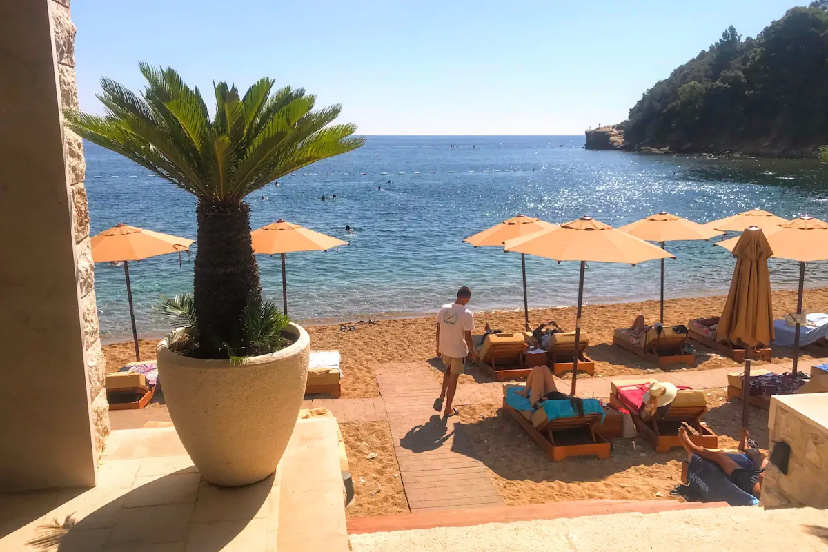Mogren II Beach with sun loungers and Adriatic restaurant