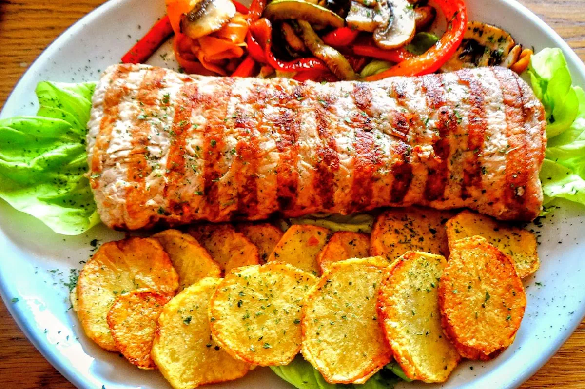 Traditional Njeguški Steak stuffed with local ham and cheese