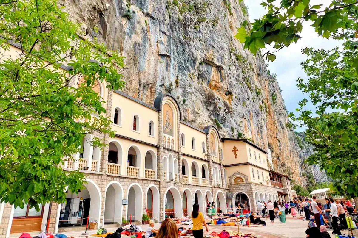 Ostrog Monastery Upper Dormitory with pilgrims sleeping outdoors on matresses