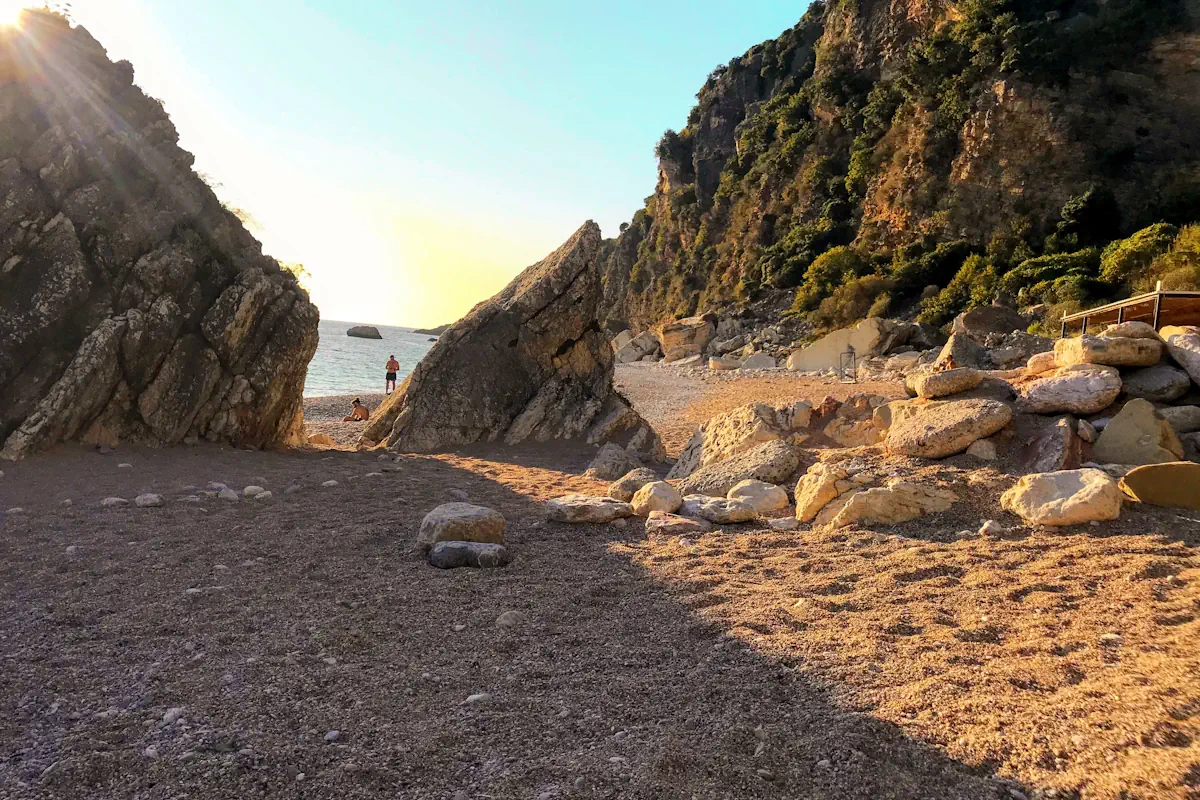 Large white rocky cleft and boulders dividing Perazica Do Beach