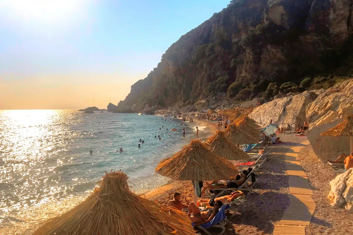 Sun Loungers and wooden parasols on Perazica Do Beach, near Petrovac