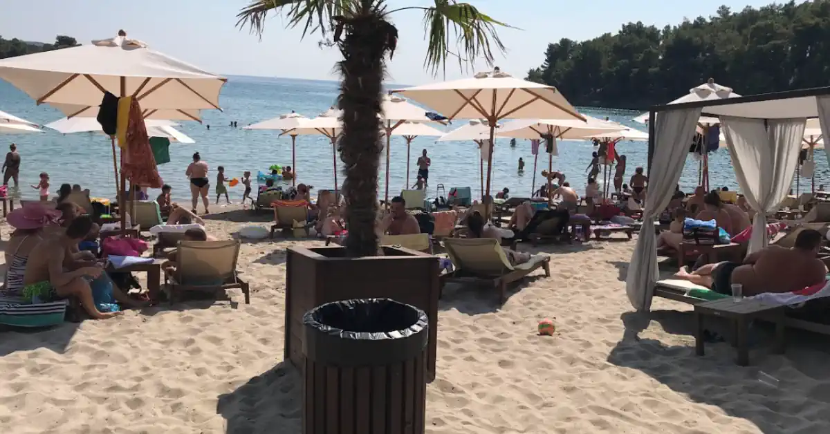 Plavi Horizonti sandy beach in Tivat with parasols and sunbeds