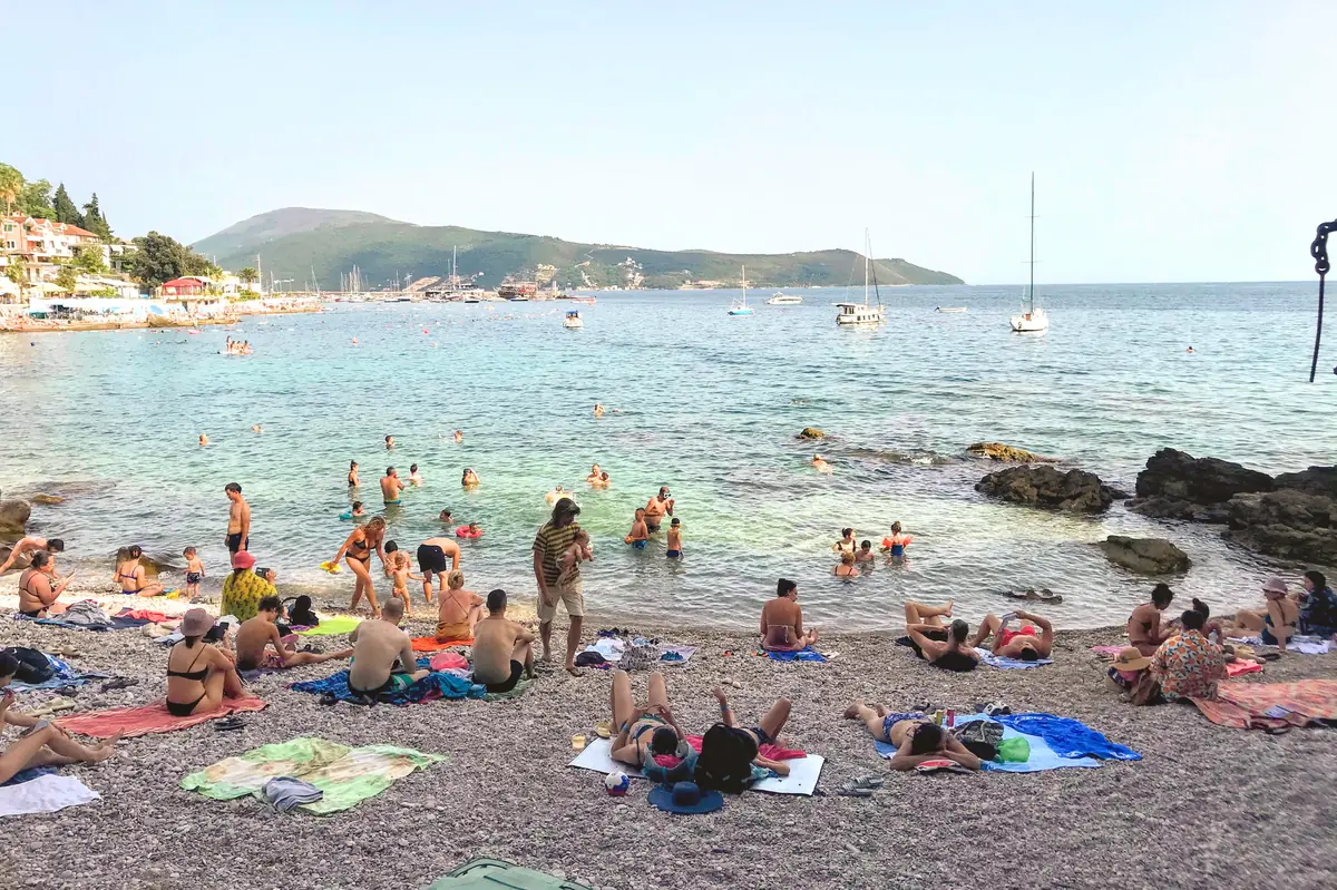 Pebble beach near the Topla tunnel overlooking the bay and Lustica Peninsula
