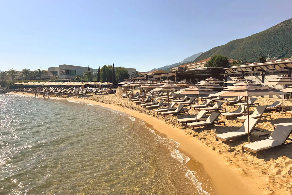 Sandy Shore with elegant loungers of Portonovi Beach Club, Montenegro