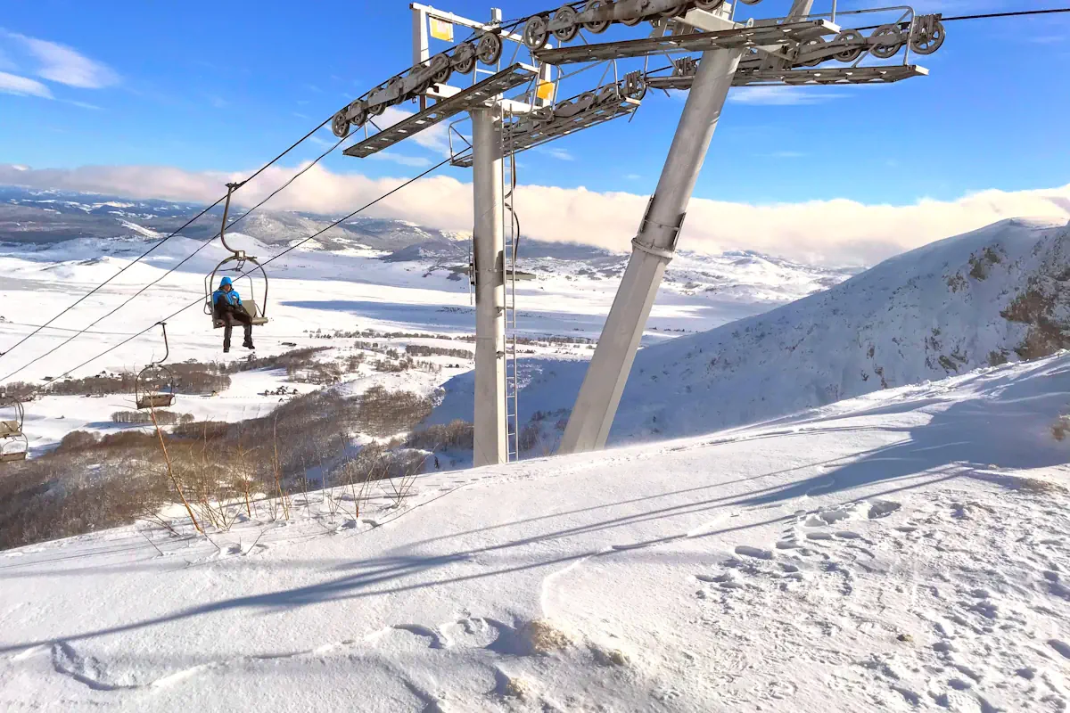 The two-stage chairlift ascending the rugged slopes of Savin Kuk in Durmitor National Park