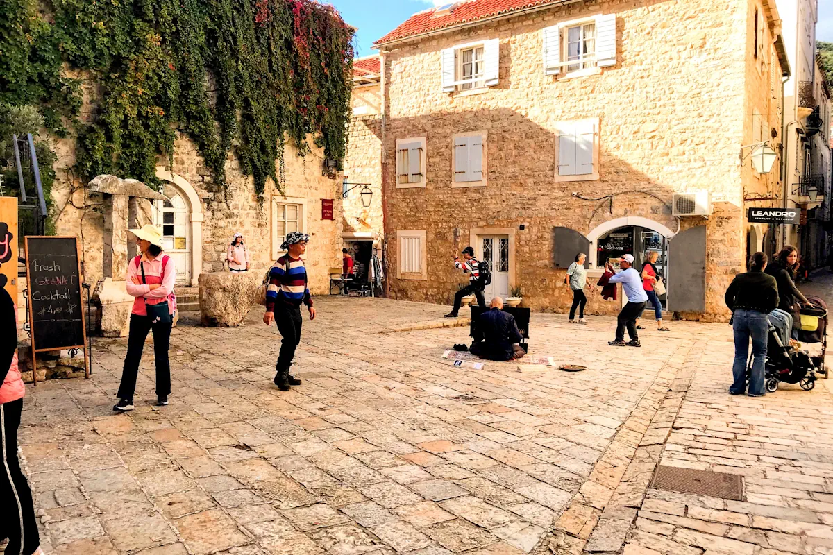 Poet's Square with performers near Budva City Museum in the Old Town
