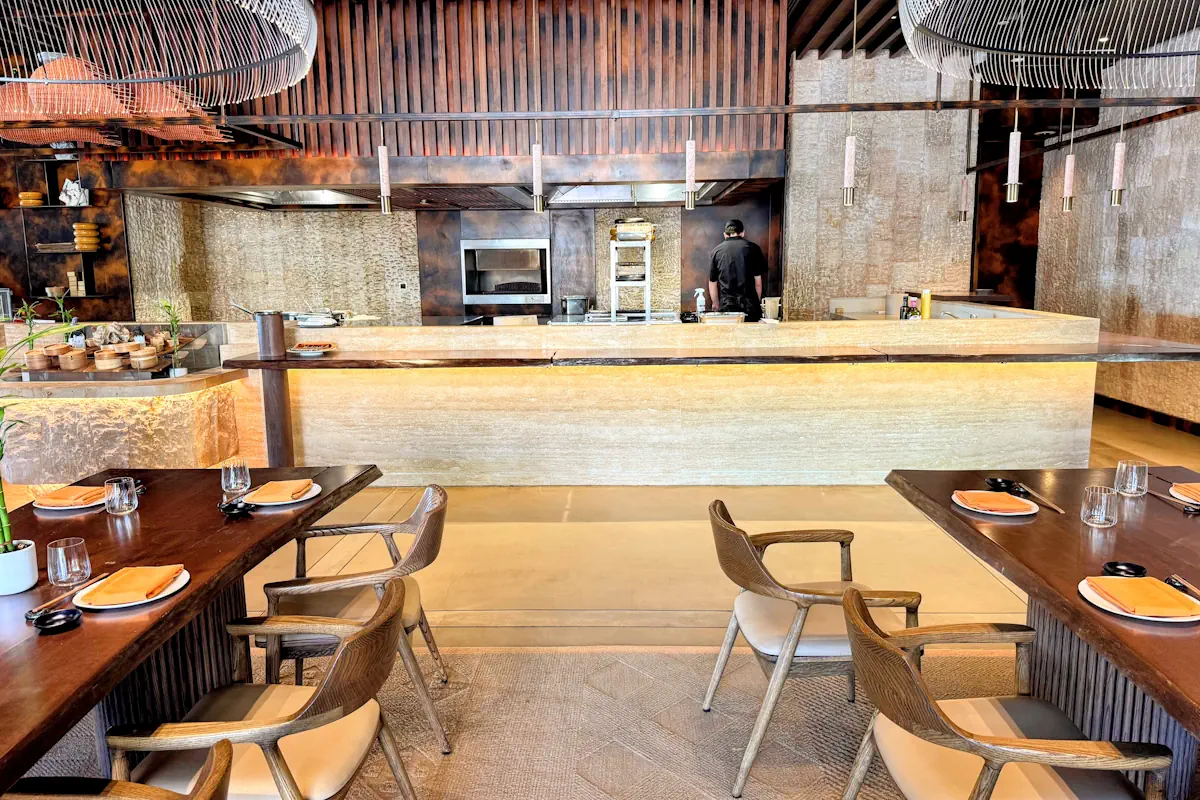 The kitchen and restaurant lounge seating layout at Tapasake One&Only Portonovi