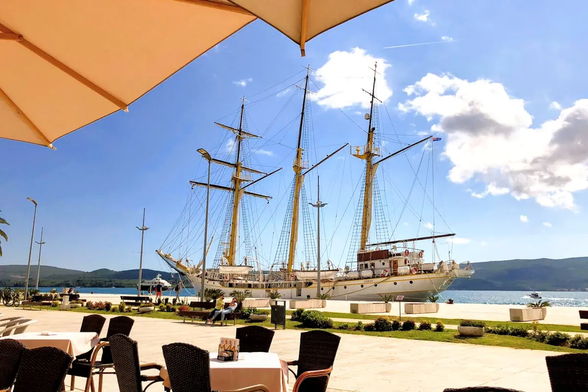 Pine Embankment Riva in Tivat with Jadran sailboat