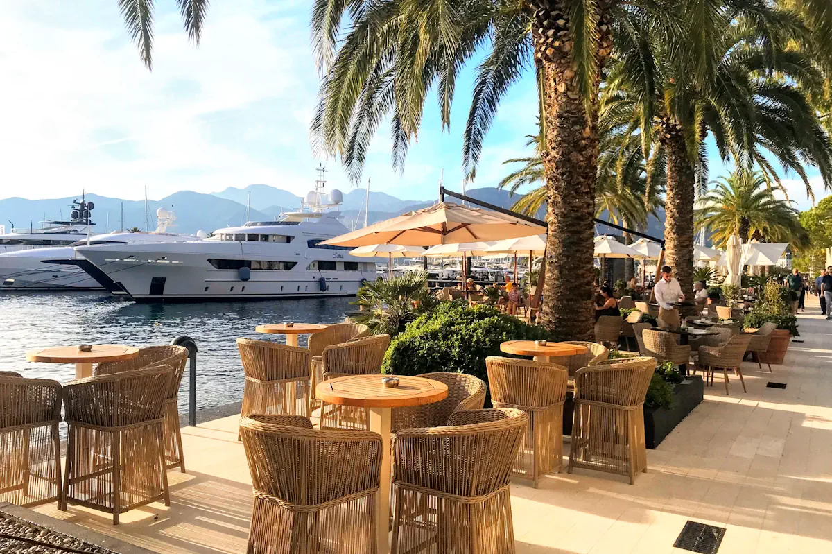 Porto Montenegro superyacht marina waterfront with restaurant terraces