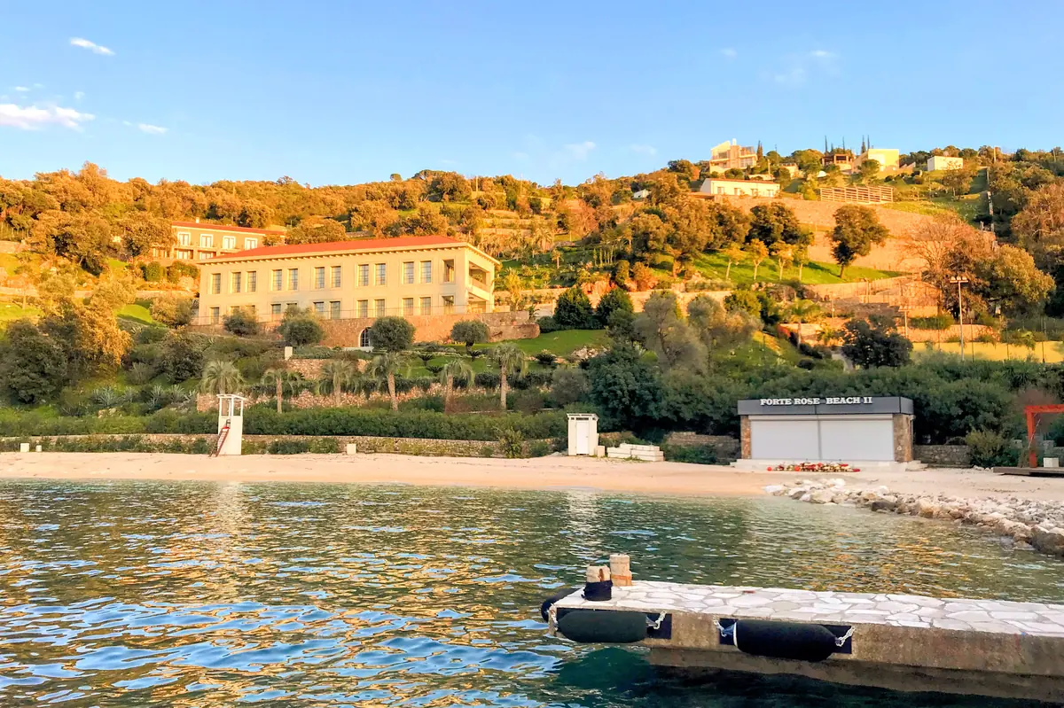 The beautifully manicured Mediterranean garden in the backdrop of Forte Rose II Beach, known for crystal clear waters, on the Luštica Peninsula