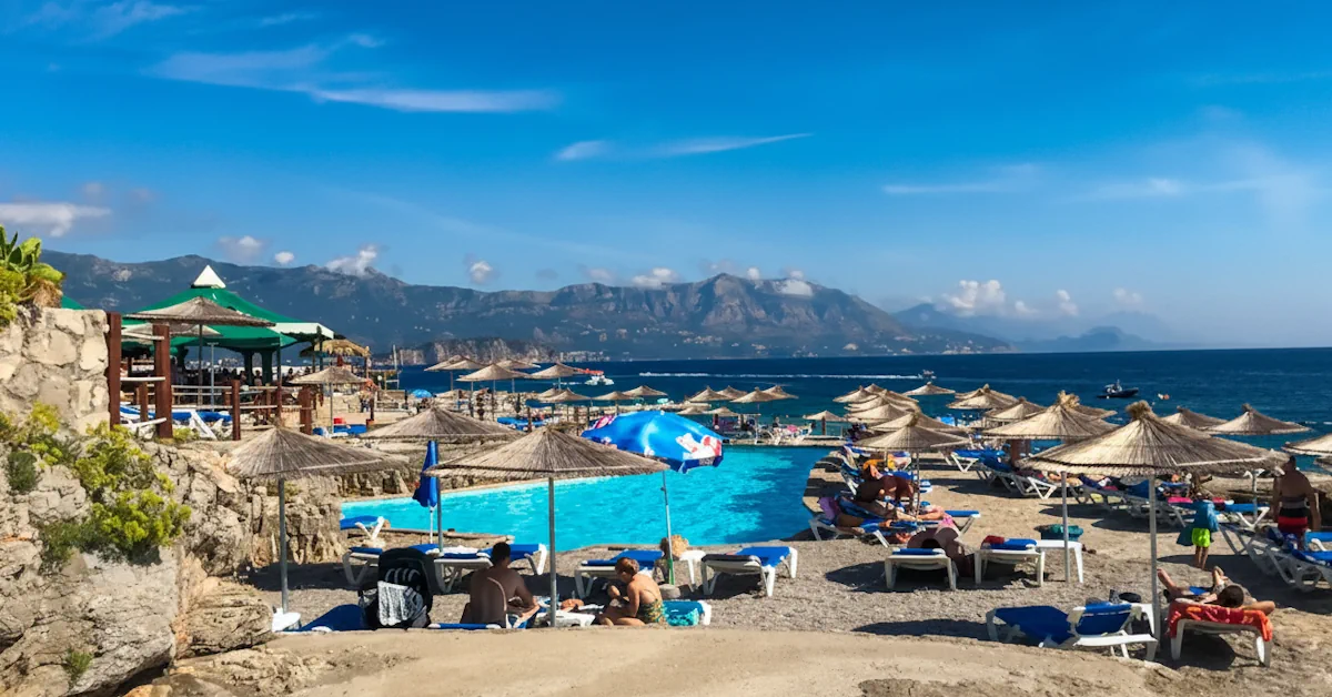 Multi-level stone plateau and seawater pools at Ploče Beach near Budva