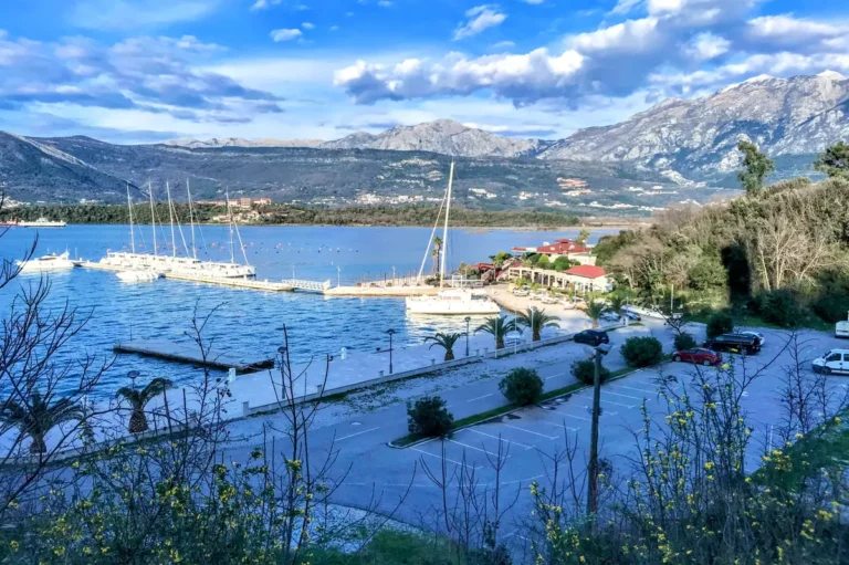 Aerial View of Solila Beach Club near Tivat and sail boats docked at the adjacent marina.