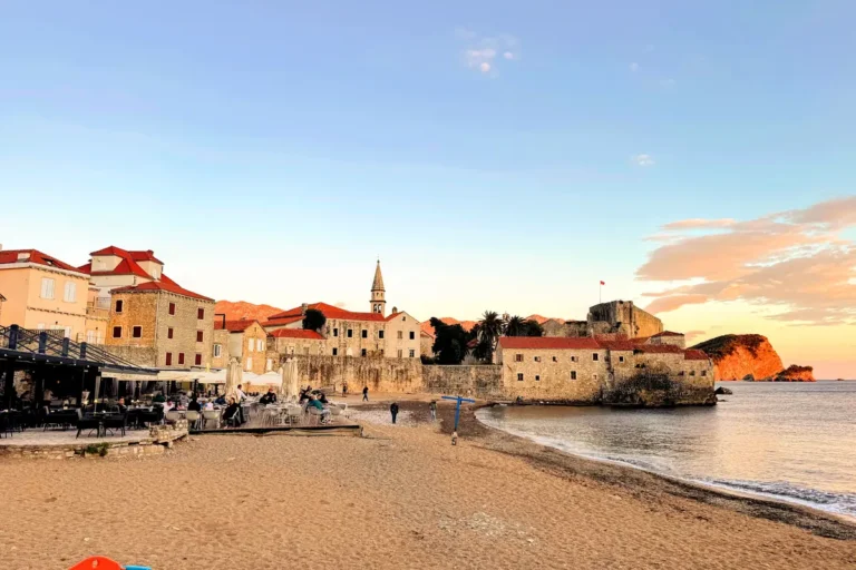 Budva Old Town from Ricardova Glava Beach in the late evening out of season