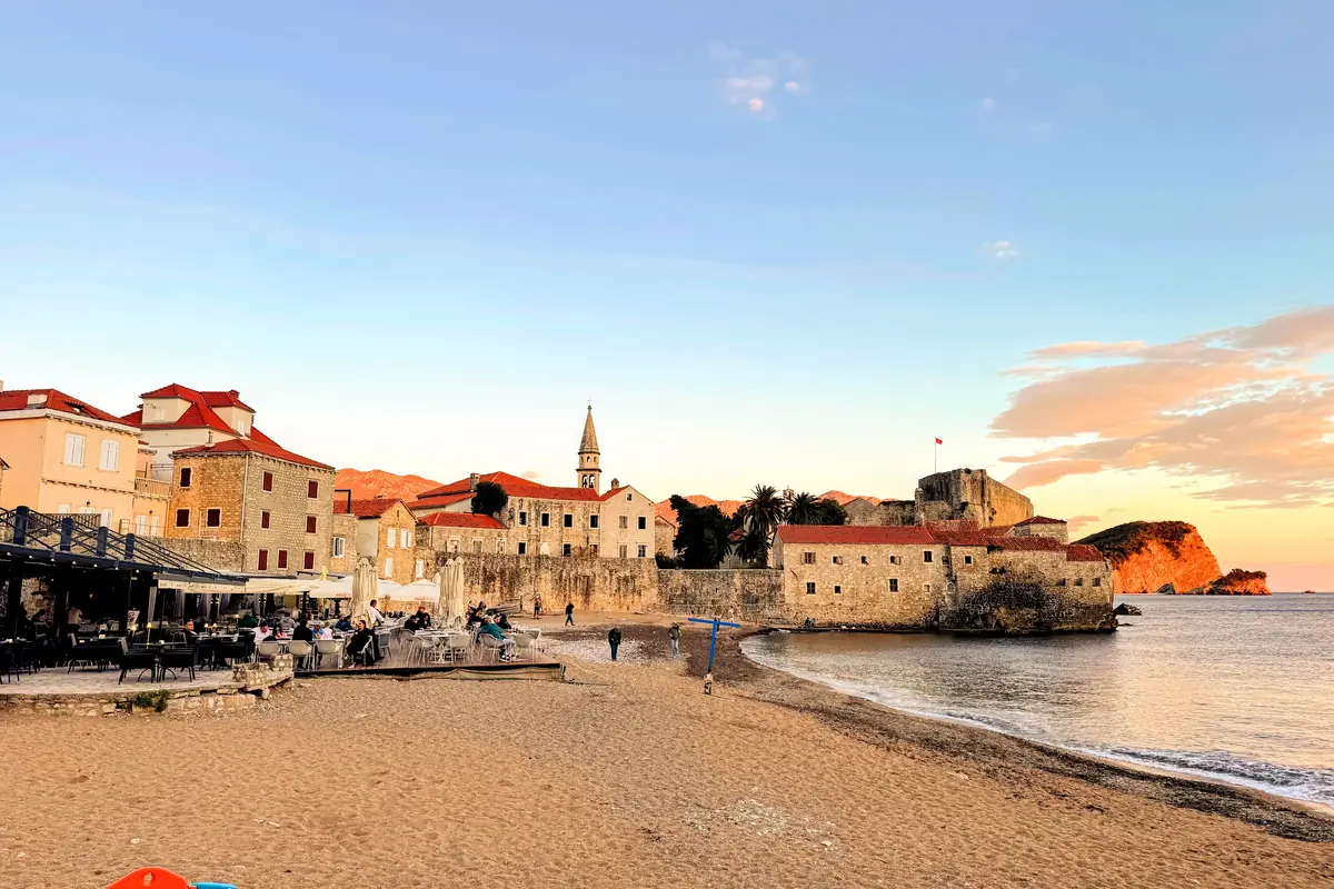 Budva Old Town from Ricardova Glava Beach in the late evening out of season