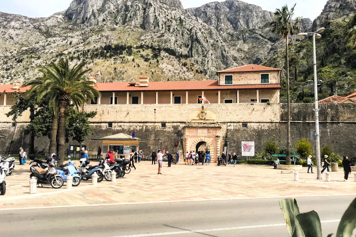 Kotor Old Town Sea Gate and City Walls view from Riva parking lot