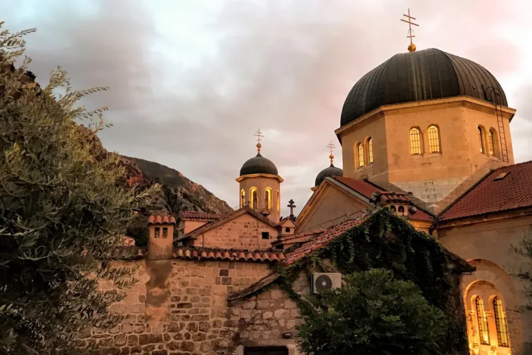 The Serbian Orthodox St. Nicholas Church in Kotor Old Town during a moody winter afternoon, showcasing the quiet off-season atmosphere.