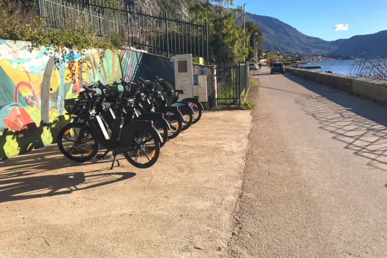 A row of city bikes available for rent at a ebike sharing shop in the neighborhood of Sveti Stasije, Dobrota.