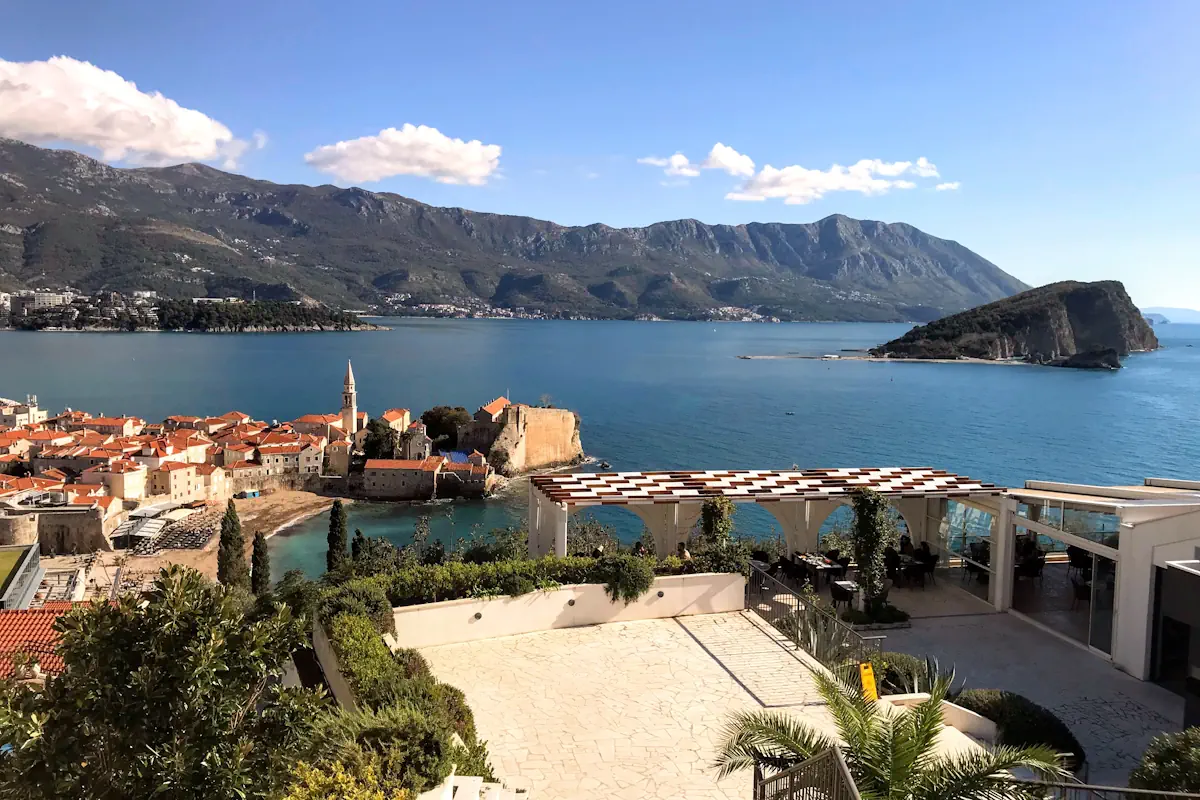 Aerial View of Budva Old Town and Sveti Nikola Island from Restaurant Vista parking lot