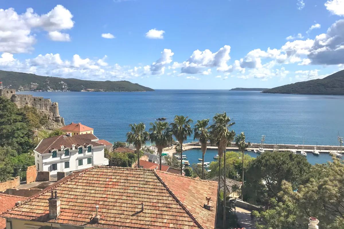 Aerial View of Herceg Novi Old Town and the Lustica Peninsula from a stone terrace