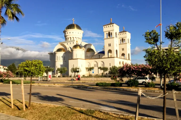The golden domes and white exterior of the Cathedral of Saint Jovan Vladimir in the center of Bar, Montenegro.