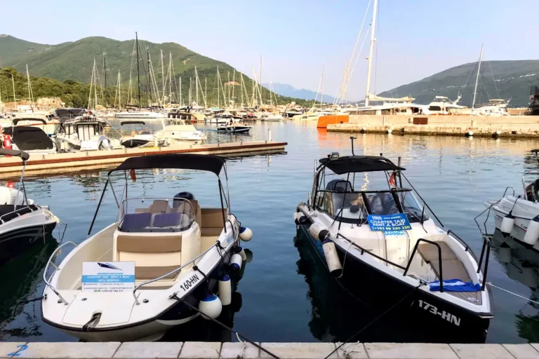 Small boats, speedboats, and sail boats for rent docked at the Meljine Marina near Herceg Novi, a popular starting point for boat tours in Montenegro.