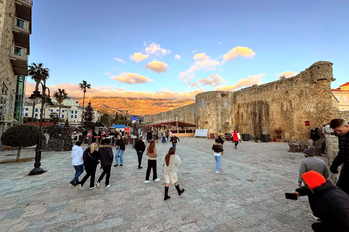 Panoramic view of Budva Old Town and City Walls from Ricardova Glava Beach, showing the main attractions and activities in Montenegro’s coastal city.