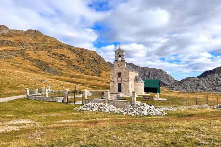 The stone Church of St. Elijah overlooking the Lukavica plateau near Kapetanovo Lake, a top destination for hiking and nature in Montenegro.