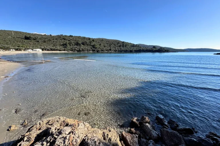 Scenic view of Plavi Horizonti beach in Radovići near Tivat, showing the destination for the local bus route from the city center.