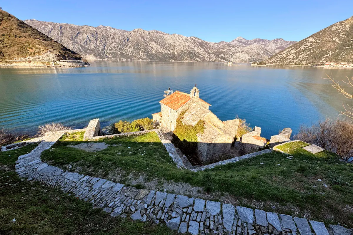 The 15th-century Gospa od Anđela (Our Lady of the Angels) church overlooking the Verige Strait in the Bay of Kotor, Montenegro.