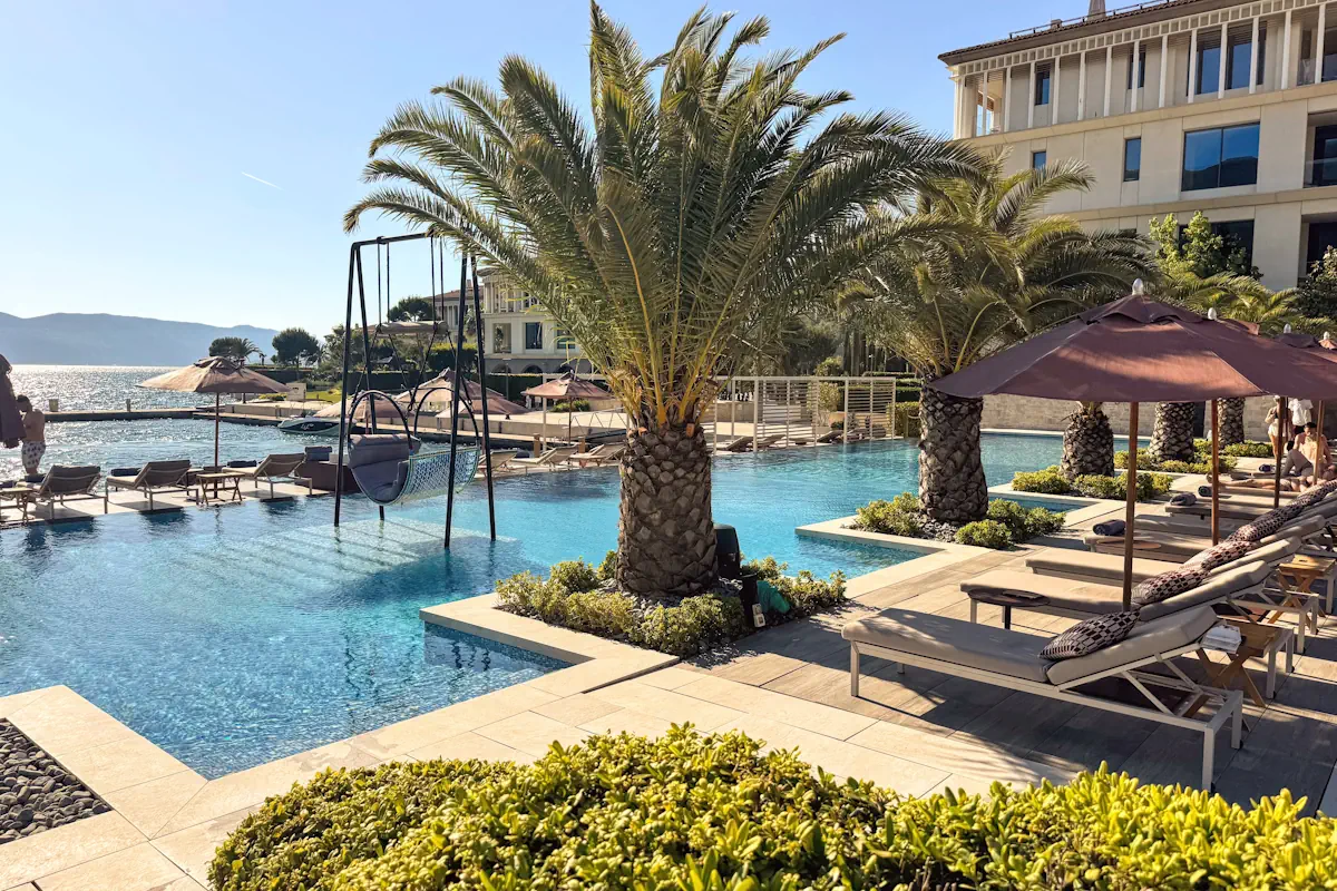 Tapasake Beach Club One and Only Portonovi Montenegro Outdoor Swimming Pool with Palms and Loungers
