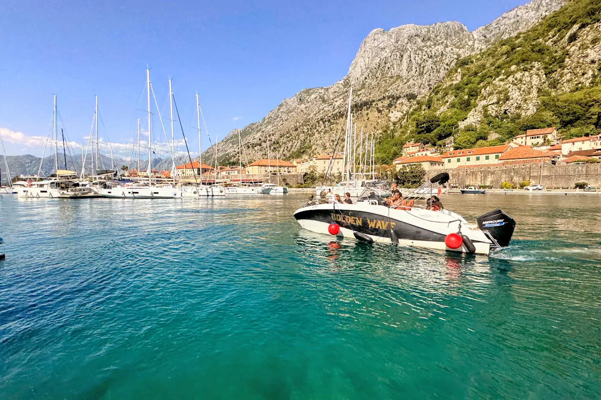 Speedboat departing from the marina in Kotor towards Perast, Mamula Island, and Blue Cave - Boat Tours Kotor