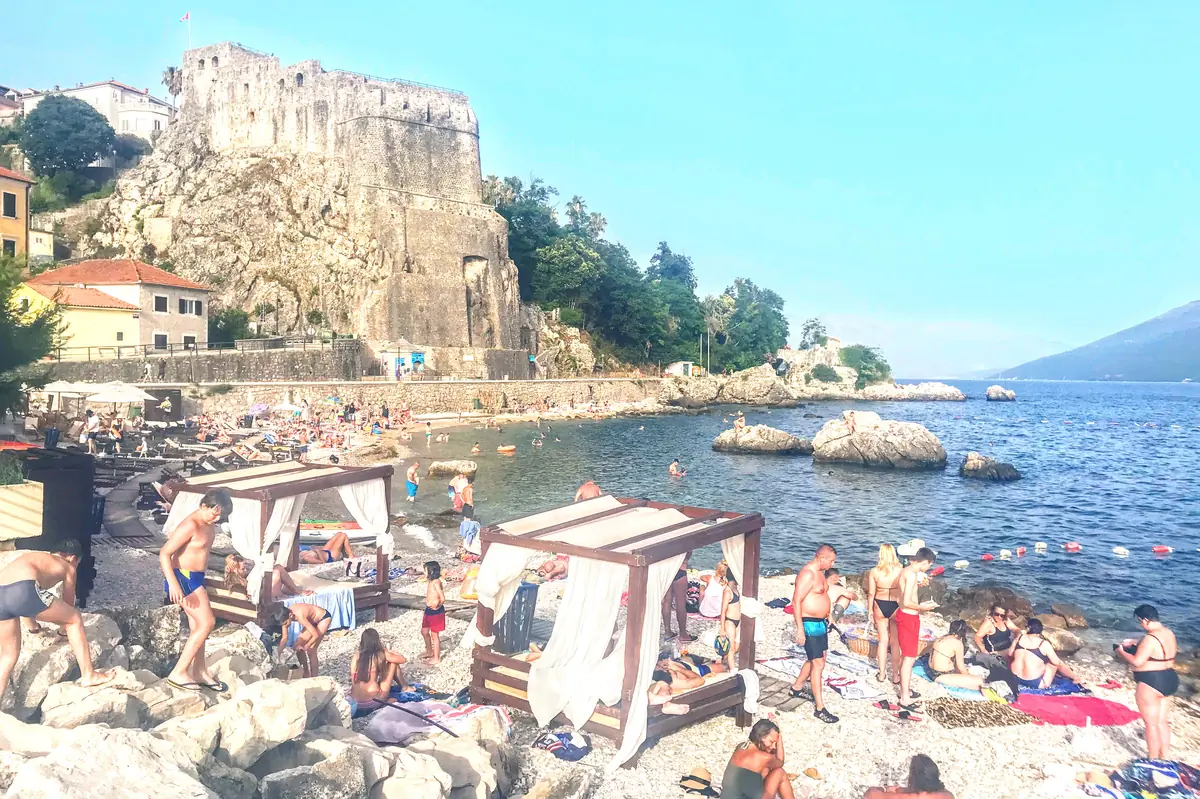 Plaža Žalo beach in Herceg Novi harbor under the fortress walls